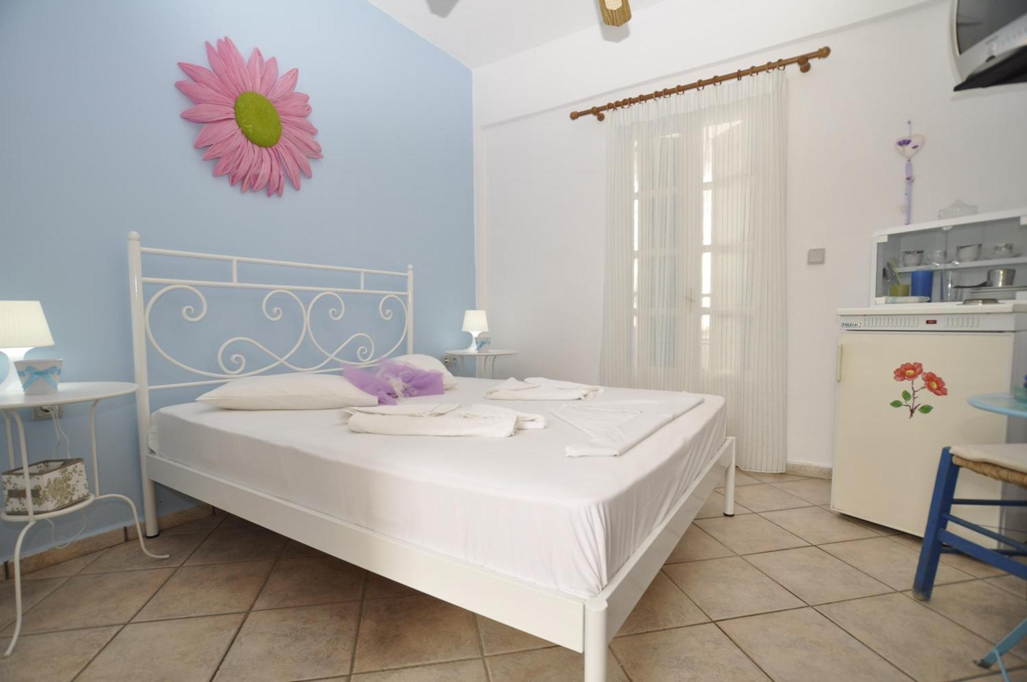 Manos Apartments Mégas Yialós-Nítes Rum bild
